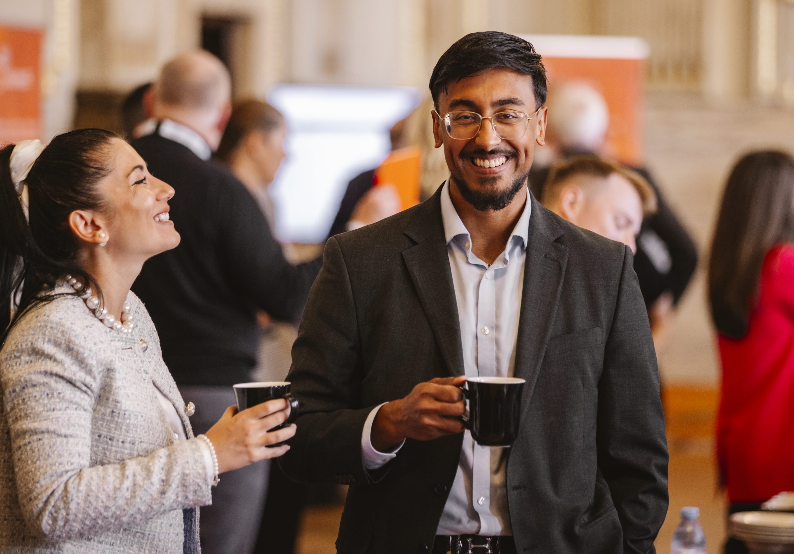 Professionals networking at the conference